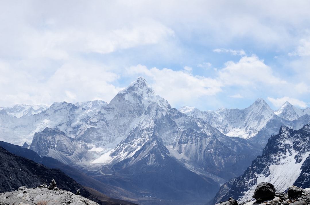 Snow-covered Himalayan peak rising above a mountain valley Snow-covered Himalayan peak rising above a mountain valley