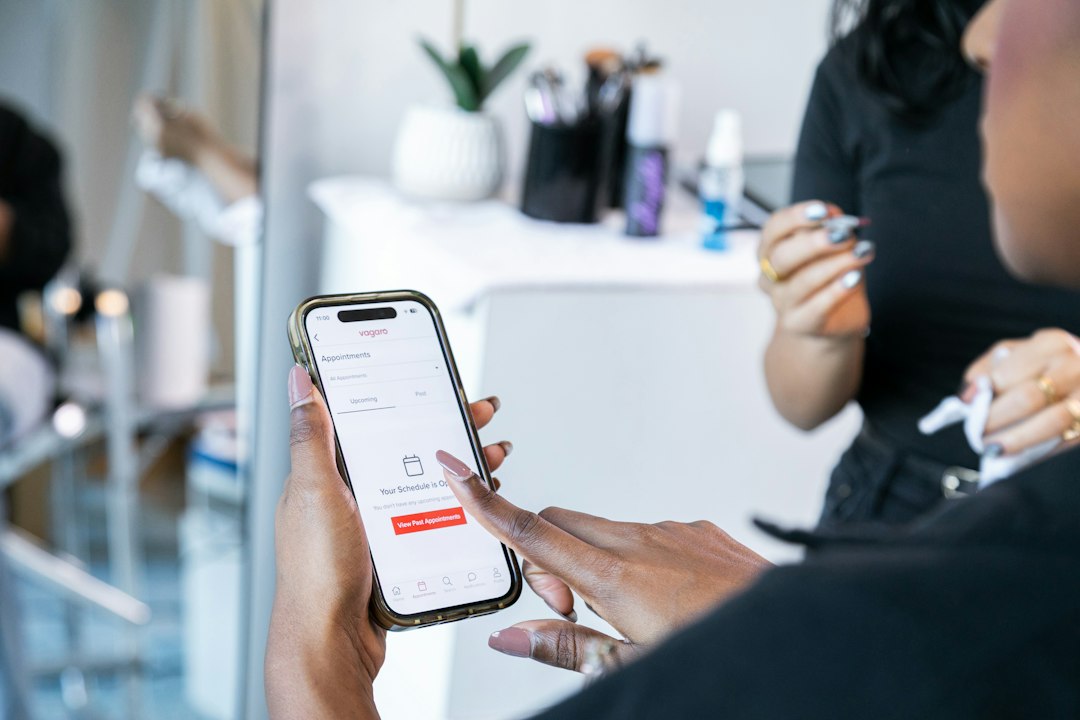 Traveller using a booking app on a smartphone Traveller using a booking app on a smartphone